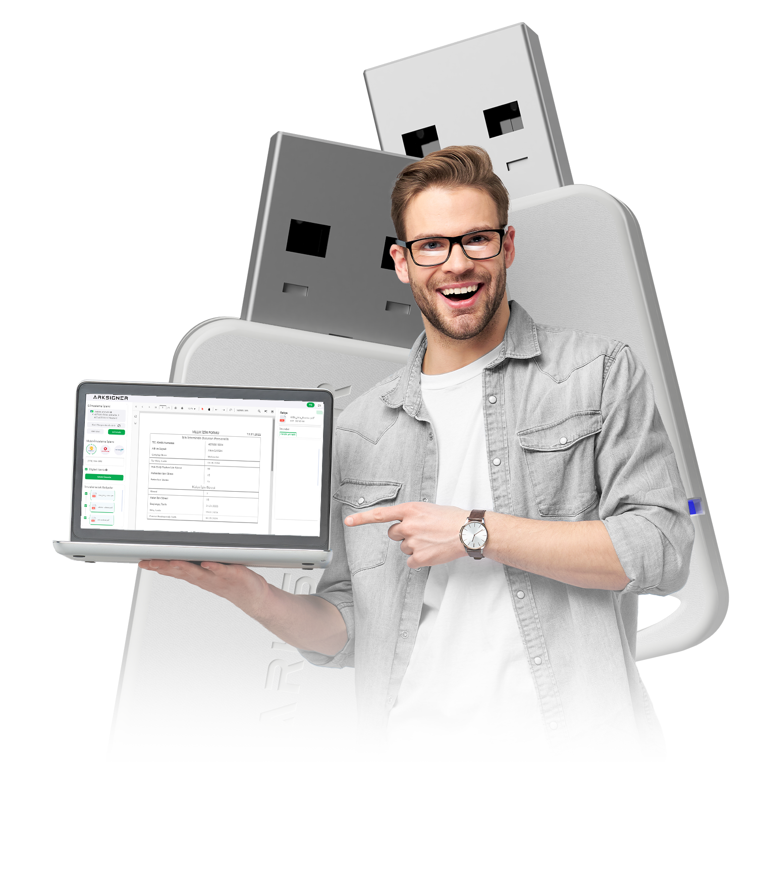 ArkSigner USB e-imza token ve ekranında e-imza uygulaması açık dizüstü bilgisayar